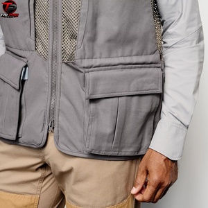 Chaleco Utilitario Acolchado para Hombre, Gris y Naranja Brillante, con Cuello en V, Cremallera Completa, Panel de Ventilación de Malla y Bolsillo Inferior con Solapa, Ideal para Caza y Actividades al Aire Libre - Product Image 4