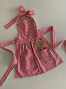 Red And <b>White</b> Striped Cotton <b>Apron</b> With Pockets Halter Neckline A-Line Silhouette Casual Style For Adults Made from Premium 100% - Product Image 1