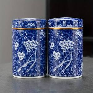 Boîte alimentaire ronde en acier inoxydable bleu et blanc à motif floral oriental avec couvercle pour la cuisine - Product Image 1
