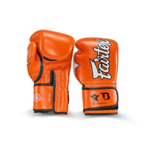 ถุงมือชกมวย Fairtex สีส้มแบบกำหนดเองได้ พร้อมสายรัดข้อมือแบบ Hook Loop ทำจากหนังวัวแท้ สำหรับกีฬาซานด้าและศิลปะการต่อสู้กลางแจ้ง - Product Image 1