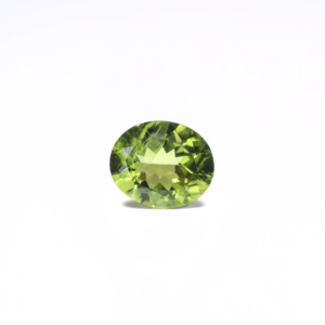 Loose Peridot Gemstone 4.62 Carat Oval Cabochon Emerald Cut Faceted for Fine Jewelry - Product Image 1