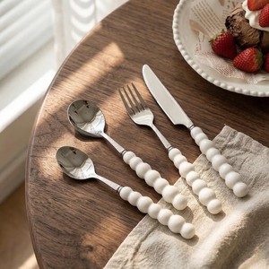 Juego de Cubiertos Modernos de Acero Inoxidable con Acabado Espejo, Mango de Cerámica, Diseño Nórdico, Aptos para Lavavajillas, Cubiertos para Bodas - Product Image 1