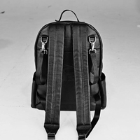 Sac à langer en cuir noir multifonctionnel et spacieux pour bébé, avec compartiments pour biberons et jouets, logo personnalisé, sac à dos pour maman