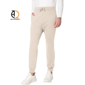 Pantalon de survêtement en coton beige pour homme, taille élastique avec cordon de serrage, décontracté, avec poches latérales, idéal pour l'automne - Product Image 1