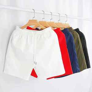 Shorts de sport décontractés pour homme, pour l'extérieur, la détente et l'entraînement, collection multicolore blanc, rouge, bleu, vert, noir - Product Image 1