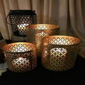 Portavelas metálico premium que agrega un encanto refinado, una luminosidad subtil y una elegancia artística a los interiores de viviendas. - Product Image 5