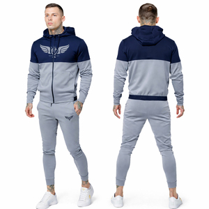 Ensemble de survêtement personnalisé pour homme, bleu marine et gris, coupe ajustée, avec sweat à capuche zippé et pantalon de jogging, idéal pour le sport et la gym - Product Image 1