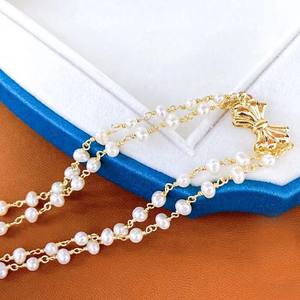 Collier en perles d'eau douce à double couche de conception française, style rétro léger et luxueux avec nœud, niche - Product Image 3