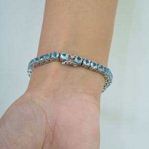 สร้อยข้อมือเทนนิสเงินแท้ 925 ประดับบลูโทแพซแท้ 100% สวยงามอลังการ สำหรับผู้หญิง เหมาะเป็นของขวัญประจำเดือนธันวาคม - Product Image 4