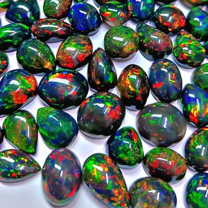 โอปอลเอธิโอเปียสีดำธรรมชาติทรงหลังเบี้ยเจียระไนแบบบริลเลียนท์ น้ำหนัก 3-5 กะรัต พร้อมใบรับรองจากผู้ตรวจสอบอิสระ เกรดท็อป สำหรับทำเครื่องประดับ - Product Image 1