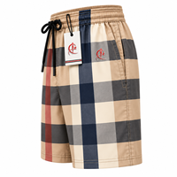 Shorts de bain respirants en toile unie pour hommes, shorts de plage décontractés, service OEM, 100 % polyester avec cordon de serrage