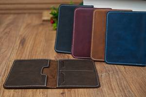 Porta Pasaportes de Cuero Genuino Esencial para el Viaje, con Bloqueo RFID, Diseño Sencillo, Ecológico y Multifuncional - Product Image 1