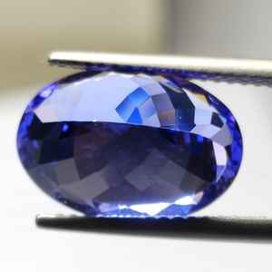 แทนซาไนต์ทรงรีเจียระไนแบบเหลี่ยมคม ขนาด 10x14 มม. น้ำหนัก 6.18 กะรัต คุณภาพเยี่ยม เหมาะสำหรับทำจี้ทองและแหวนเป็นของขวัญ - Product Image 1