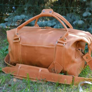 กระเป๋าหนังแท้แบบดัฟเฟิล กระเป๋าเดินทางวินเทจสำหรับวันหยุดสุดสัปดาห์  ขนาดใหญ่ น้ำหนักเบา ซิปปิด  สำหรับทุกเพศ  ขายตรงจากโรงงาน - Product Image 1