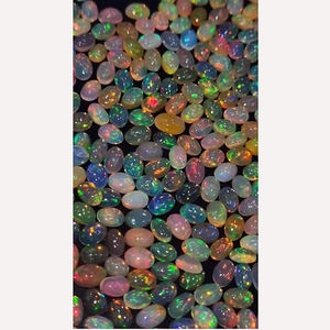 โอปอลเอธิโอเปียธรรมชาติ 651 ชิ้น พร้อมประกายไฟ ขนาด 6x4 มม. รูปทรงวงรี คาโบชอง น้ำหนัก 211 กะรัต คุณภาพดีจาก Iroc Sales อัญมณีหลวม ราคา 169 ดอลลาร์สหรัฐ - Product Image 1