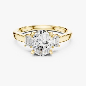 Bague de fiançailles en or jaune 9 carats avec diamant ovale de 1,50 carat cultivé en laboratoire et trois pierres latérales baguette – Vente en gros - Product Image 1