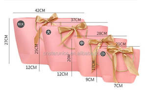 Bolsa de Papel para Regalos y Dulces con Laminado Brillante Rosa Personalizado, Estilo Moderno, con Asa de Listón, Producto de Embalaje en Oferta - Product Image 4