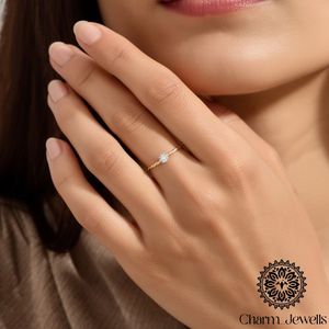 แหวนหมั้นผู้หญิง Charm_Jewells ชุบทอง 18K ประดับเพชรโมอิสซาไนต์ทรงลูกแพร์ ดีไซน์เรียบหรู - Product Image 5