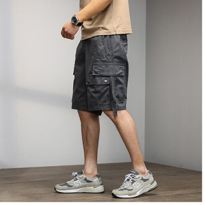 Shorts de sport en polyester pour hommes, taille élastique, coupe ample, longueur genou, couleur unie, pour l'été - Product Image 1