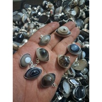 Vente en gros de pendentifs de mauvais œil Sulemani Style Feng Shui gravé amour pierre précieuse de guérison naturelle polie accessoire de mode