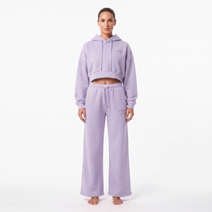 Conjunto de dos piezas de algodón y felpa para mujer: Sudadera corta con capucha de manga larga y hombros caídos, y pantalón jogger de pierna ancha. Ropa casual al por mayor. - Product Image 1