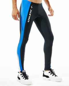 Leggings de fitness pour hommes, taille élastique, couleur unie, amincissant, longueur intégrale, respirant, résistant à l'eau, séchage rapide - Product Image 5