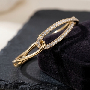 Luxury Diamond Interlocking Twist <b>Bangle</b> in 10k 14k 18k Yellow Gold Sparkling Micro Pave statement <b>Bracelet</b> - Product Image 2