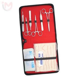 Kit d'entraînement à la suture en acier inoxydable pour étudiants en médecine avec instruments manuels et matériel pédagogique dans un étui rouge - Product Image 1