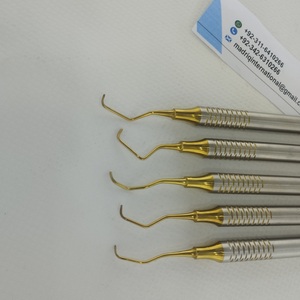 Ensemble d'instruments de restauration dentaire en composite plaqué or Madriq, en acier inoxydable - Product Image 1