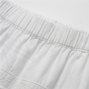 Jupe courte en coton blanc pour femmes, style A, avec volants, taille élastique, design uni, à porter en toutes saisons - Product Image 4