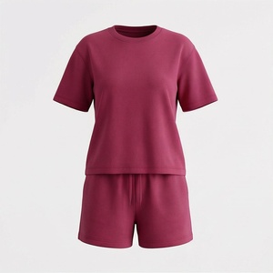 Ensemble 2 pièces tricoté pour femme : T-shirt à manches courtes de couleur unie et short au-dessus du genou, col rond, coupe ample, décontracté, pour le printemps et l'été - Product Image 1
