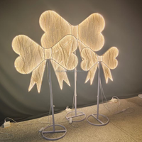 2024 Ailes de papillon de lumière d'arc de décoration de mariage de style Offre Spéciale de LED