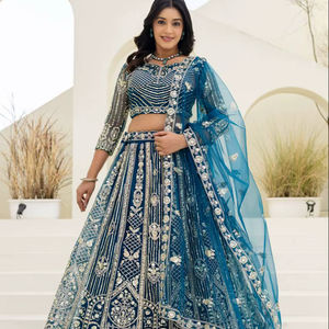 Lehenga de Ramdev Trading con Bordado Intrincado, Tonos Ricos y Artesanía Atemporal, Material de Red Reciclada que Exala Lujo y Elegancia - Product Image 1