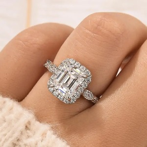 925 Moissanite Luxury Halo Emerald Cut <b>Simulated</b> <b>Diamond</b> Engagement Ring in White Gold Plated Moissanite Ring for Wholesale. - Product Image 1