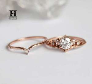 แหวนเพชรทรงกลมเพาะเลี้ยงแบบสั่งทำพิเศษ ทองคำขาว 18K ดีไซน์โบราณแบบฉลุลายโค้ง ประดับมิลเกรน สำหรับเจ้าสาว - Product Image 6
