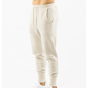 Pantalon de jogging en coton beige pour homme, taille élastique, cordon de serrage, poches latérales, style décontracté streetwear, idéal pour l'automne - Product Image 5