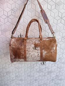 กระเป๋าเดินทางหนังวัวแท้ลายขนสัตว์ ดีไซน์เฉพาะตัว ทำมือ ใช้ได้หลากหลาย  กระเป๋าเดินทางหนังวัวแท้ขนสัตว์  สำหรับทุกเพศ - Product Image 3