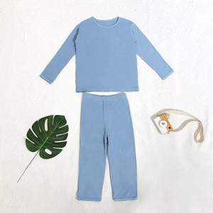 Ropa Infantil de Marca Privada Personalizada de Fábrica, Pijama de Bambú Suave con Textura Waffle en Azul y Amarillo, Conjunto de Ropa para Bebé - Product Image 1