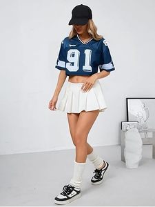 Conjunto Deportivo de Top Corto con Número 91 Azul y Falda Plisada Blanca, Material de Algodón, Diseño Bordado a Mano - Product Image 1
