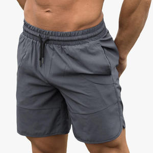 Shorts de sport pour homme en polyester respirant, couleur unie, séchage rapide, avec cordon de serrage à la taille et poches, longueur courte, style décontracté - Product Image 1
