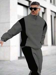 Conjunto deportivo informal de invierno para hombre, con sudadera de cierre de cremallera y pantalones jogger en color gris oscuro y negro con bloques de color, de forro polar. - Product Image 2
