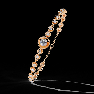 Bracelet stationné avec diamants de laboratoire ronds sertis en clos, en or rose 14 carats, bijoux fins modernes - Product Image 1