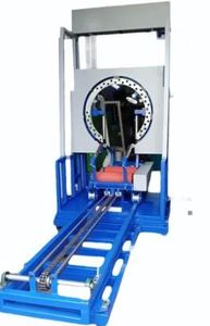 Machine d'enroulement automatique de bobines verticales triphasée avec emballage plastique et système de levage et de descente par engrenages - Product Image 2