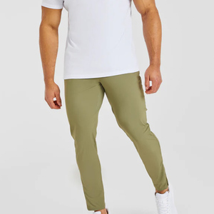 Pantalons de jogging pour hommes en vert olive, taille élastique, décontractés, légers, respirants, avec poches latérales, en tricot, en spandex et en polyester, pour l'été - Product Image 1