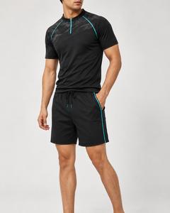 Ensemble Athlétique Homme Tendance Noir Séchage Rapide Respirant avec Accents Vert Néon Manches Longues Rash Guard et Short Tenue Active Écologique - Product Image 1