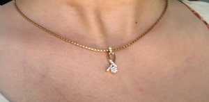 9KT Gold Round Brilliant Cut Natural Diamond <b>Ribbon</b> Twist Pendant with Micro Pave & Pressure Setting IGI Certified - Product Image 3