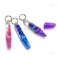 Porte-clés stylo liquide à effet de mouvement Dauphin 0,5 mm Plastique 10 cm Encre noire/bleue Promotionnel