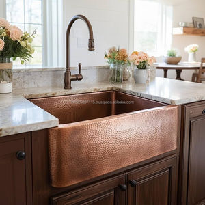 Fregadero de cocina rústico de cobre que complementa los gabinetes de madera, encimeras de piedra y los estilos de decoración interior natural con calidez. - Product Image 2