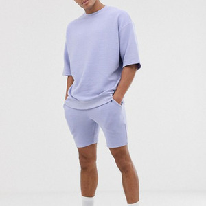 Ensemble de survêtement en coton bleu clair pour homme, col rond, manches courtes, coupe ample, couleur unie, vêtements décontractés d'été avec poches latérales - Product Image 4