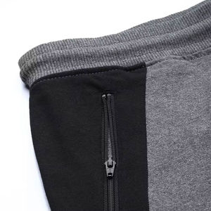 Pantalon de survêtement gris pour homme avec taille élastique, empiècements latéraux noirs, cordon de serrage, pantalon décontracté en maille, idéal pour l'automne - Product Image 4
